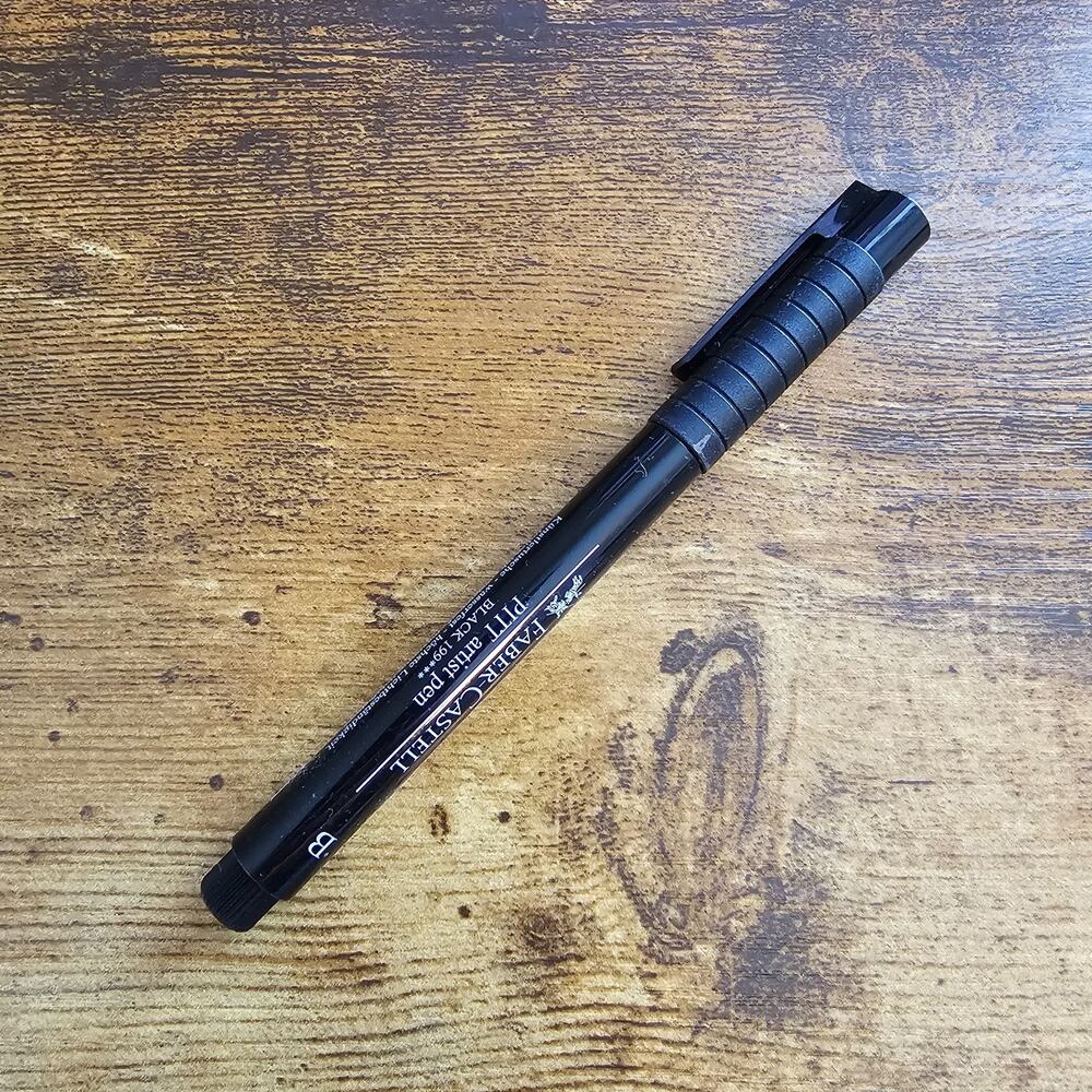 Faber-Castell Pitt Artist Pen with a brush tip in black India ink